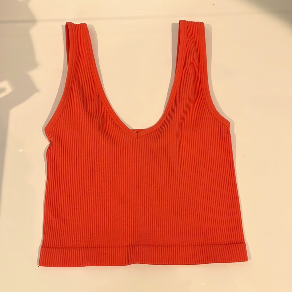 This Is An Orange Tight Crop Top Never Used
